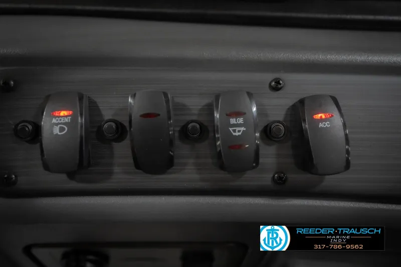 Slide: The Image of Control panel of 2026 Bennington 22 SSR boat with illuminated switches. - 36