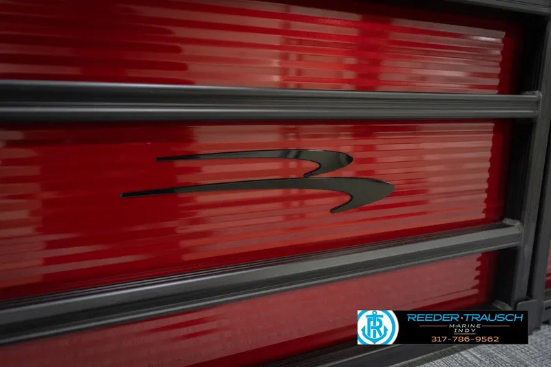 Slide: The Image of 2026 Bennington 22 SSR boat with sleek red paneling and logo detail. - 45