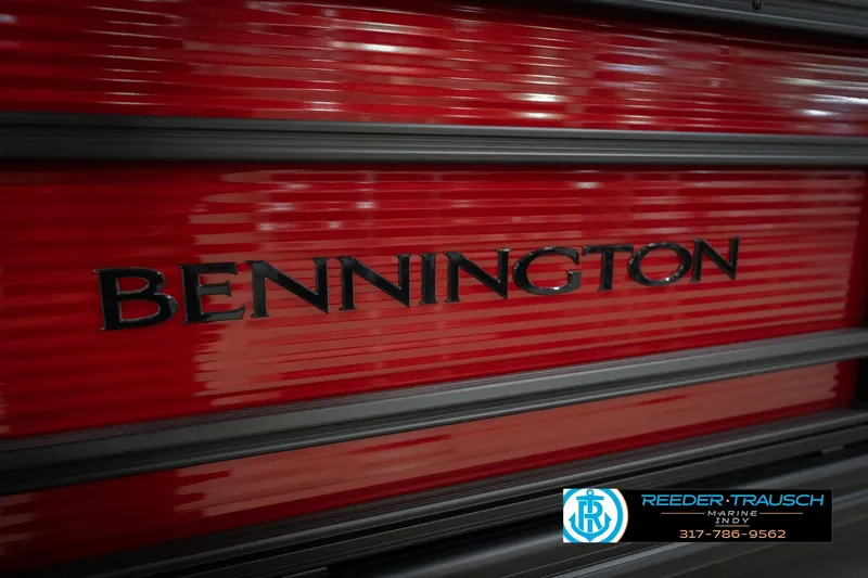 Slide: The Image of Close-up of 2026 Bennington 22 SSR logo on red background, Reeder-Trausch Marine contact info visible. - 46
