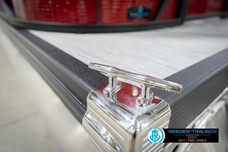 Slide: The Image of 2026 Bennington 22 SSR boat cleat detail with Reeder-Trausch Marine logo. - 49