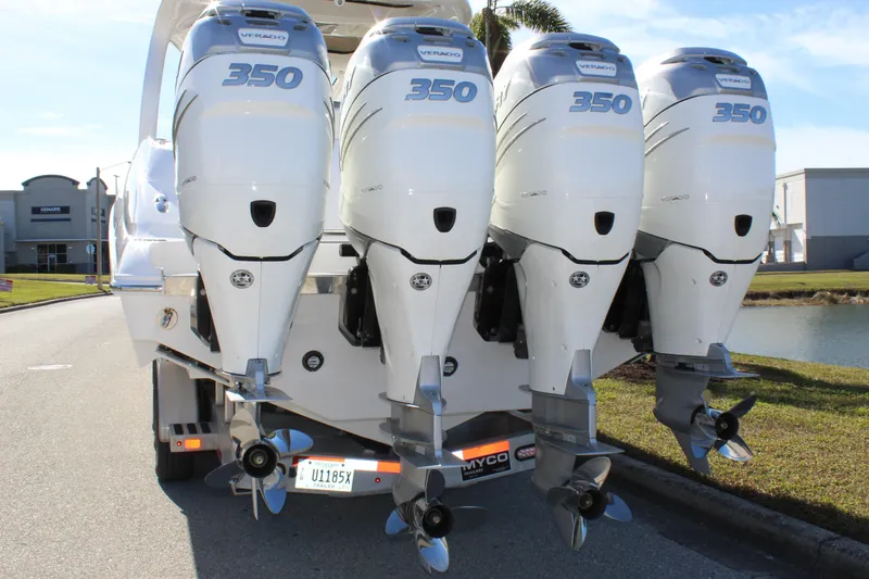Slide: The Image of 2019 Deep Impact 399 Sport boat with four powerful 350 horsepower outboard engines. - 19