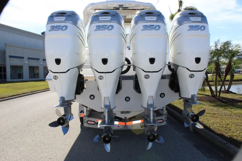 Slide: The Image of 2019 Deep Impact 399 Sport boat with four powerful 350 horsepower outboard engines. - 20