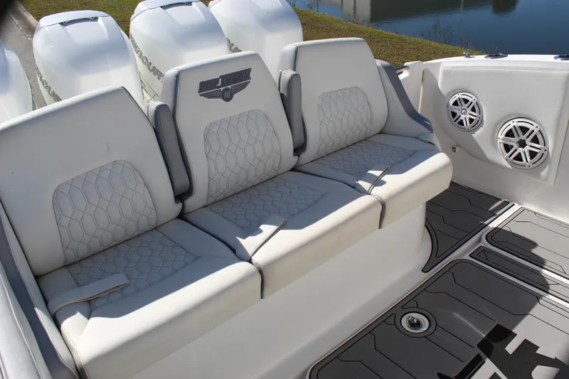 Slide: The Image of 2019 Deep Impact 399 Sport boat seating with stylish upholstery and integrated speakers. - 37