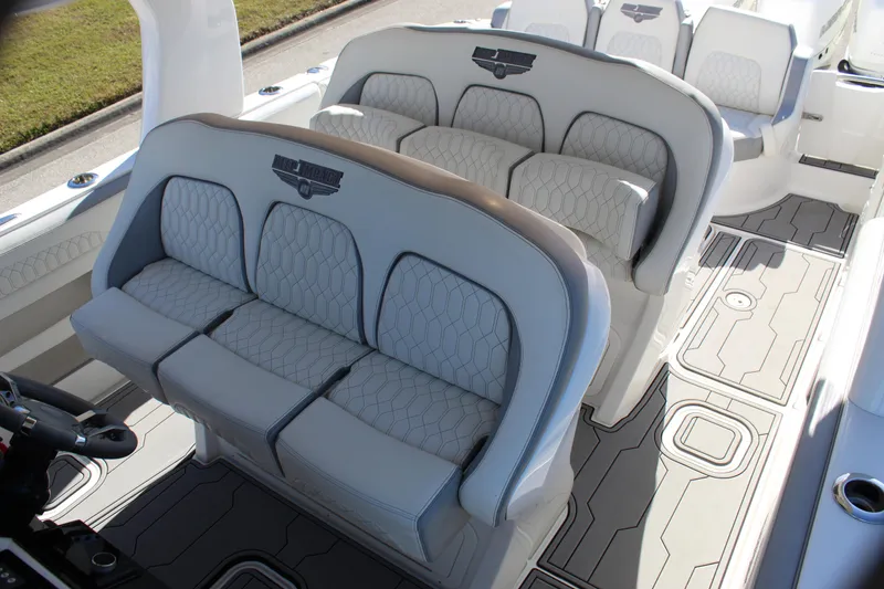 Slide: The Image of 2019 Deep Impact 399 Sport boat interior with luxurious seating and modern design. - 39