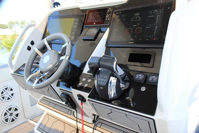 Slide: The Image of Control panel of a 2019 Deep Impact 399 Sport boat with advanced navigation systems. - 45