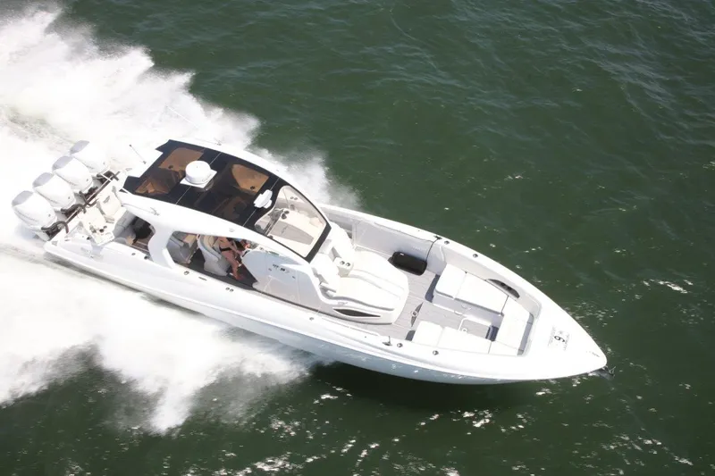 Slide: The Image of 2019 Deep Impact 399 Sport boat speeding on water, aerial view. - 76