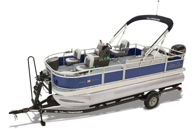 Slide: The Image of 2026 Sun Tracker Bass Buggy 18 DLX boat interior with steering wheel and seats. - 3