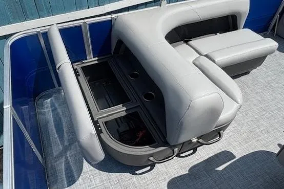 Slide: The Image of 2026 Sun Tracker Party Barge 18 DLX pontoon boat seating with storage compartments. - 21