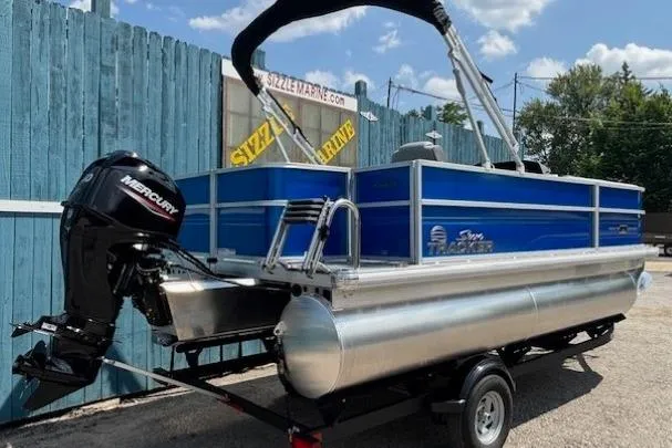 Slide: The Image of 2026 Sun Tracker Party Barge 18 DLX pontoon boat with Mercury outboard motor. - 3