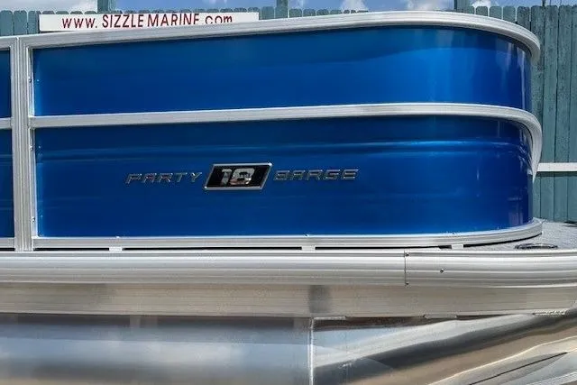 Slide: The Image of 2026 Sun Tracker Party Barge 18 DLX pontoon boat with blue exterior. - 6