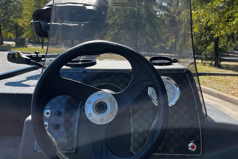 Slide: The Image of Steering wheel and dashboard of 2026 Tracker Bass Tracker Classic XL boat. - 6