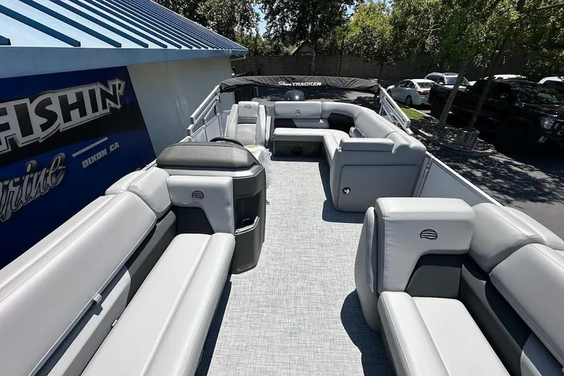 Slide: The Image of 2026 Sun Tracker Party Barge 20 DLX with spacious seating and modern design. - 11