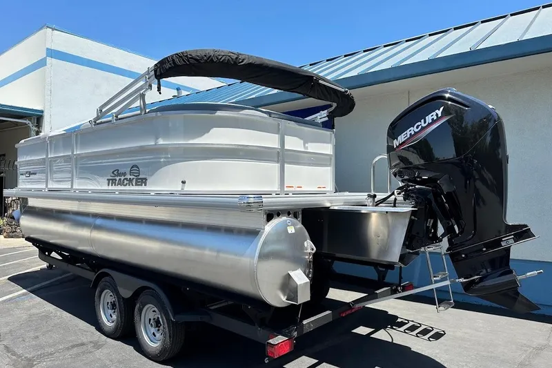 Slide: The Image of 2026 Sun Tracker Party Barge 20 DLX pontoon boat with Mercury outboard motor. - 8