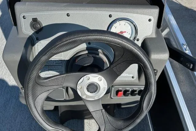 Slide: The Image of Steering console of 2026 Sun Tracker Bass Buggy 16 XL Select pontoon boat. - 7