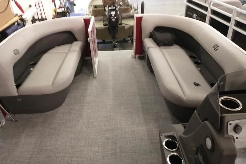 Slide: The Image of 2026 Sun Tracker Party Barge 16 DLX interior with spacious seating and modern design. - 4