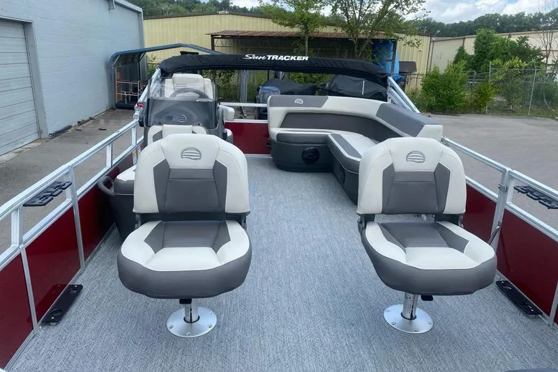 Slide: The Image of 2026 Sun Tracker Bass Buggy 16 XL Select pontoon boat with comfortable seating. - 5