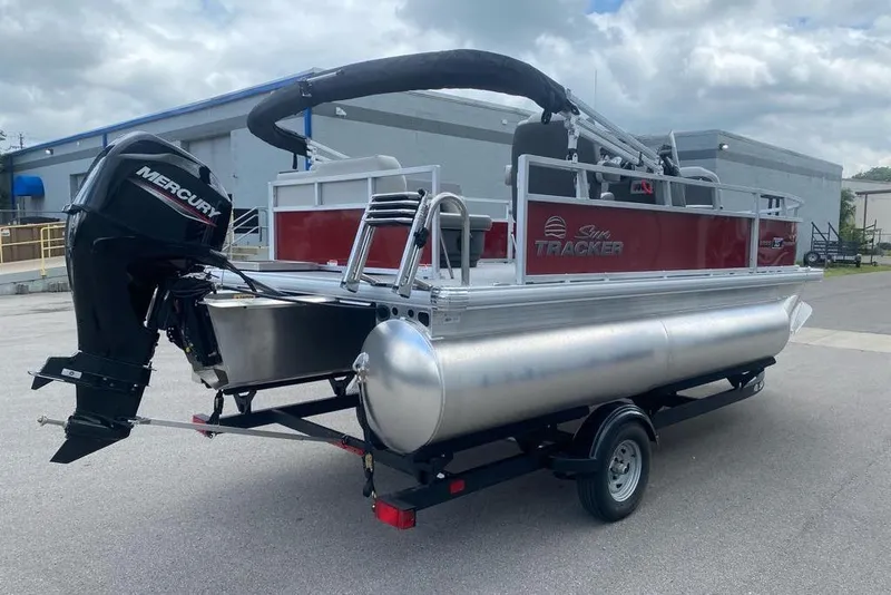 Slide: The Image of 2026 Sun Tracker Bass Buggy 16 XL Select pontoon boat with Mercury outboard motor. - 7