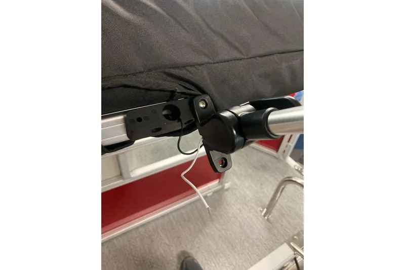 Slide: The Image of Close-up of Sun Tracker Bass Buggy 16 XL Select 2026 boat canopy attachment. - 78