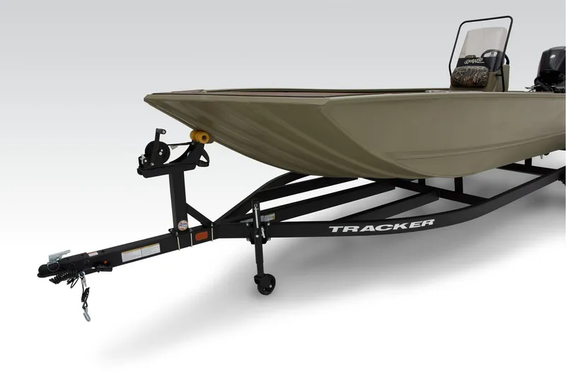 Slide: The Image of 2026 Tracker Grizzly 2072 CC boat with camouflage seating and steering console. - 7