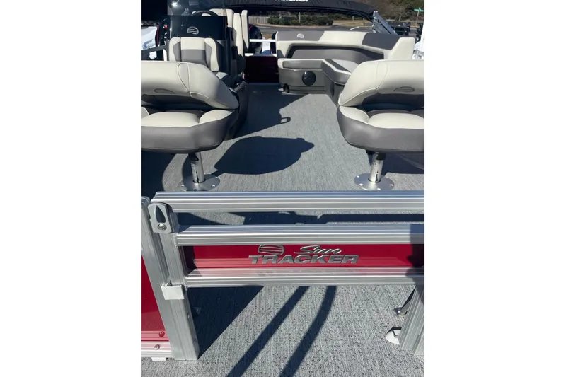 Slide: The Image of 2026 Sun Tracker Bass Buggy 16 XL Select pontoon boat interior with seating. - 2