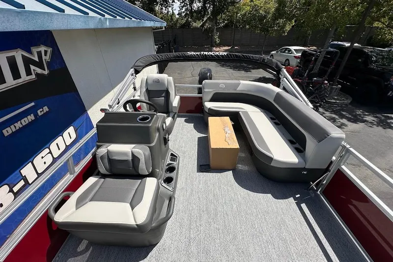 Slide: The Image of 2026 Sun Tracker Bass Buggy 16 XL Select pontoon boat with spacious seating and modern design. - 10