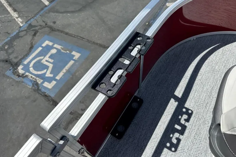 Slide: The Image of 2026 Sun Tracker Bass Buggy 16 XL Select boat interior with accessible parking space nearby. - 23