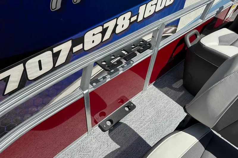 Slide: The Image of 2026 Sun Tracker Bass Buggy 16 XL Select interior with seating and railing details. - 25