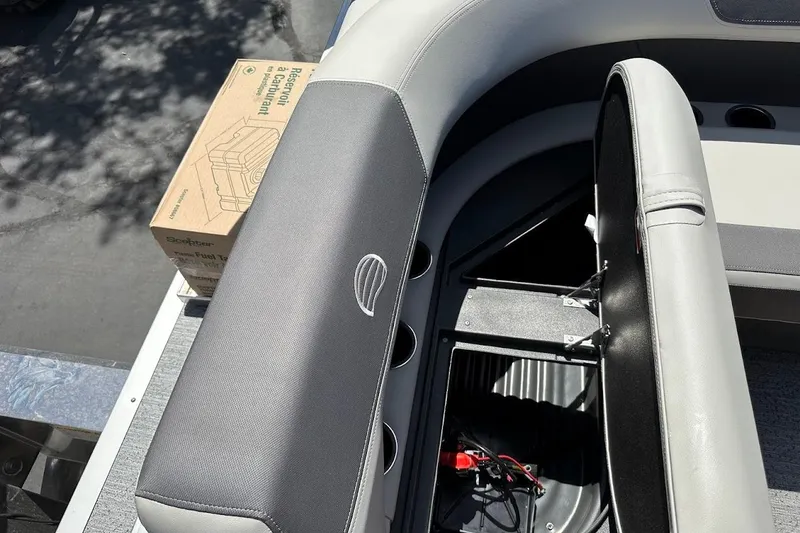 Slide: The Image of 2026 Sun Tracker Bass Buggy 16 XL Select boat interior with storage compartment and fuel tank box. - 28