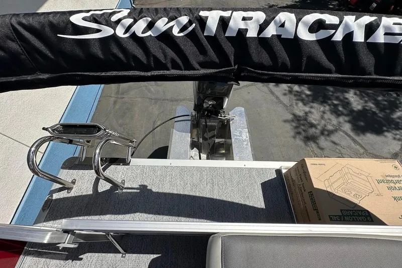 Slide: The Image of 2026 Sun Tracker Bass Buggy 16 XL Select boat deck with accessories and packaging. - 29