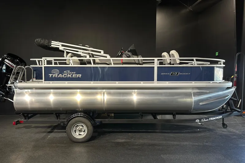 Slide: The Image of 2026 Sun Tracker Bass Buggy 18 DLX pontoon boat on trailer, side view. - 14