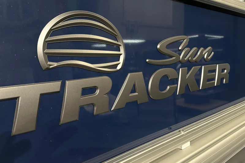 Slide: The Image of Sun Tracker Bass Buggy 18 DLX 2026 logo on blue background. - 19