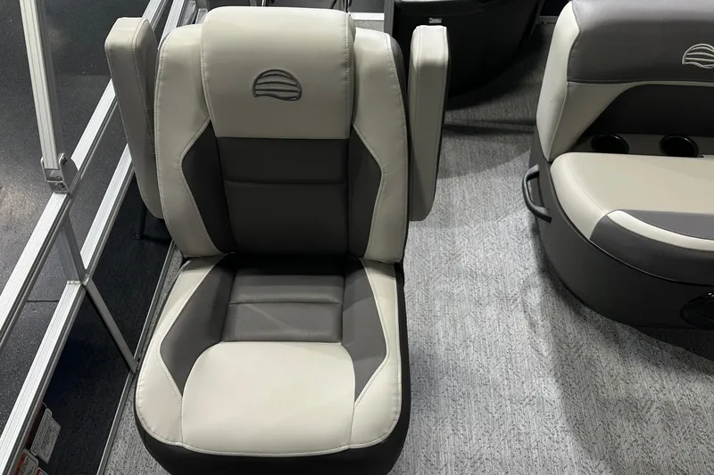 Slide: The Image of 2026 Sun Tracker Bass Buggy 18 DLX boat seat, gray and beige upholstery. - 30