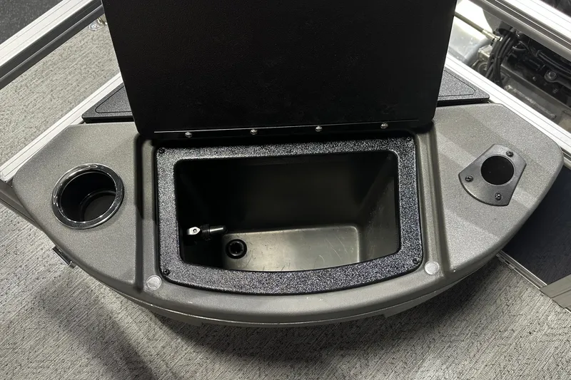 Slide: The Image of Open storage compartment on 2026 Sun Tracker Bass Buggy 18 DLX boat. - 40
