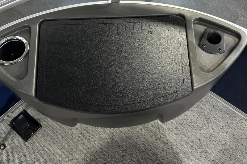 Slide: The Image of Control panel of 2026 Sun Tracker Bass Buggy 18 DLX with cup holders. - 44