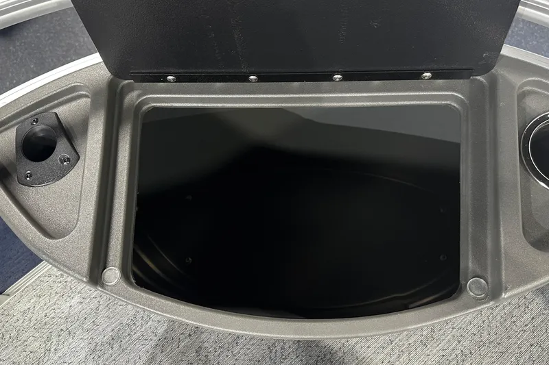 Slide: The Image of Open storage compartment on 2026 Sun Tracker Bass Buggy 18 DLX boat. - 47