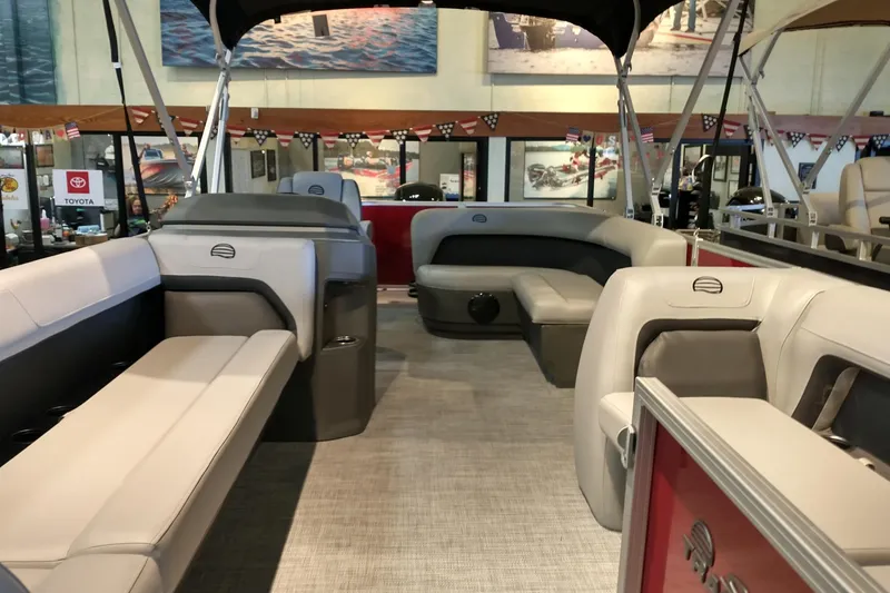 Slide: The Image of 2026 Sun Tracker Party Barge 18 DLX interior with spacious seating and modern design. - 4