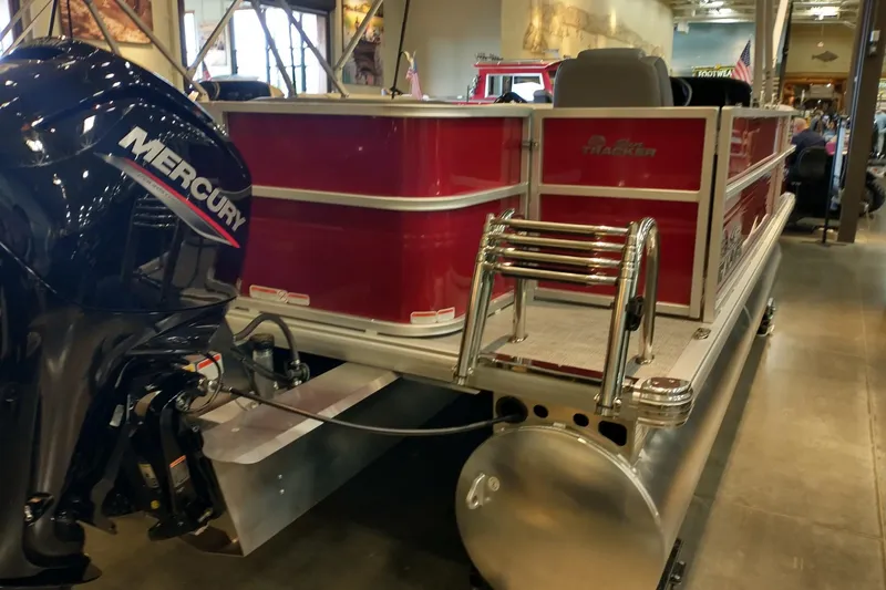 Slide: The Image of 2026 Sun Tracker Party Barge 18 DLX pontoon boat with Mercury outboard motor. - 6