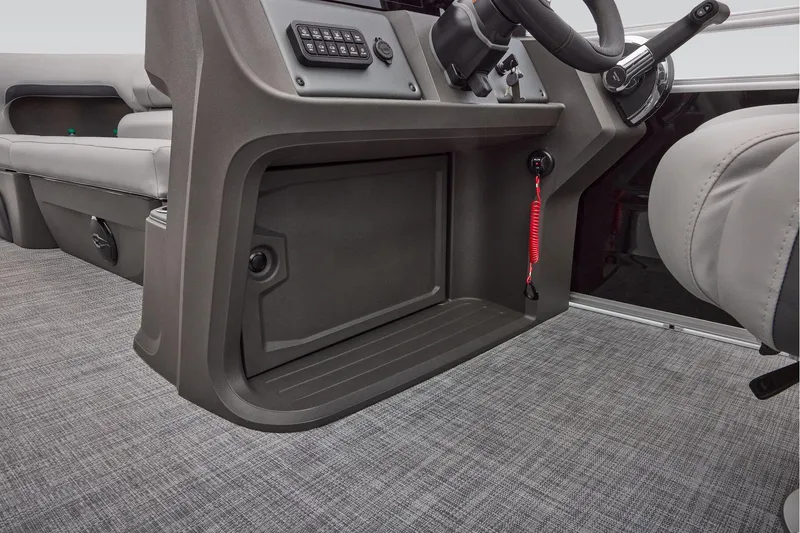 Slide: The Image of 2026 Sun Tracker SportFish 20 DLX dashboard with control panel and steering wheel. - 35