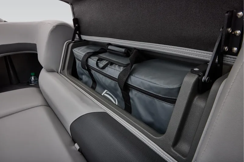 Slide: The Image of 2026 Sun Tracker SportFish 20 DLX boat console with storage and cup holders. - 49