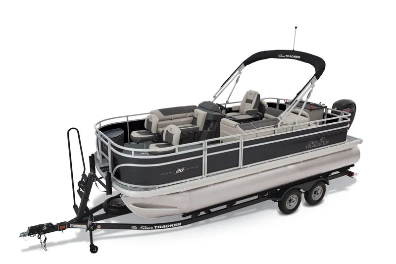 Slide: The Image of 2026 Sun Tracker Fishin' Barge 20 DLX pontoon boat on display outdoors. - 3
