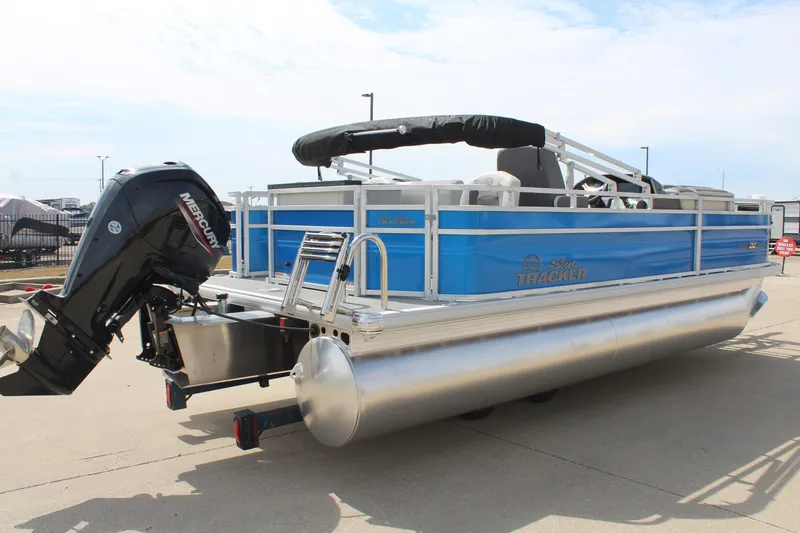 Slide: The Image of 2026 Sun Tracker Fishin' Barge 20 DLX pontoon boat with Mercury outboard motor. - 5