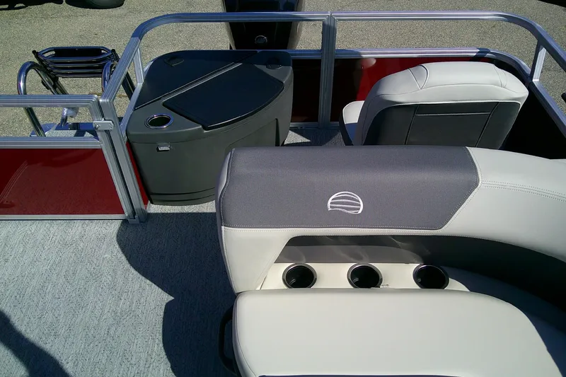 Slide: The Image of 2026 Sun Tracker Bass Buggy 18 DLX interior with seating and storage compartments. - 9