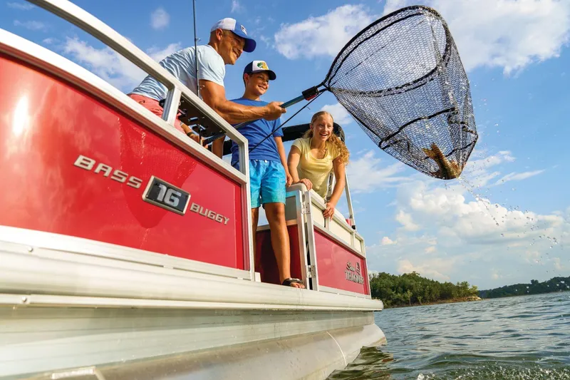 Slide: The Image of Family fishing on 2026 Sun Tracker Bass Buggy 16 XL Select pontoon boat. - 76