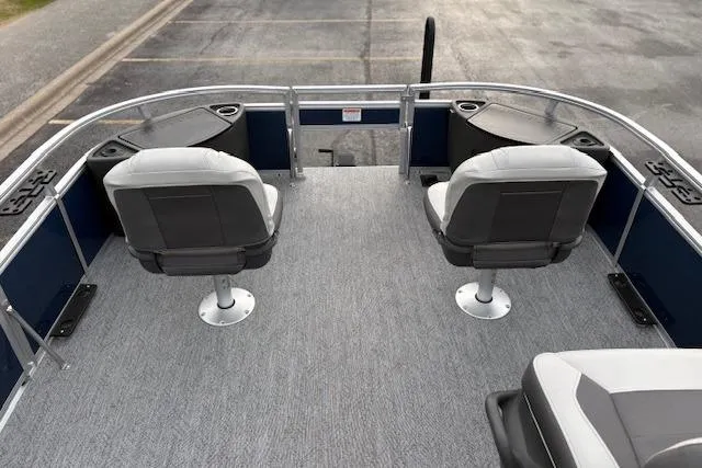 Slide: The Image of 2026 Sun Tracker Bass Buggy 18 DLX pontoon boat interior with two swivel seats. - 13