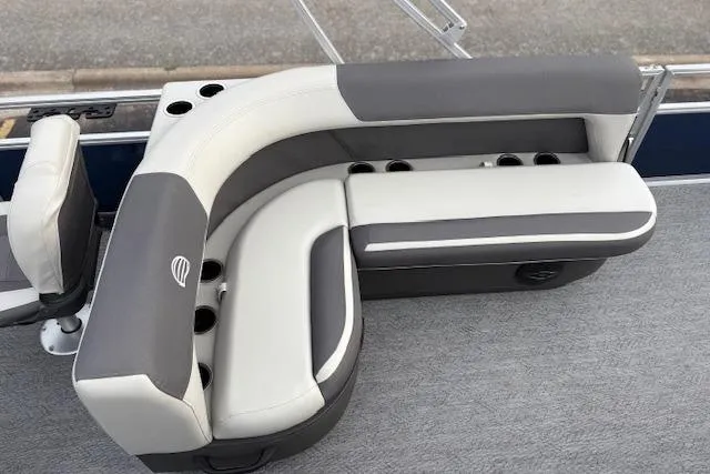 Slide: The Image of 2026 Sun Tracker Bass Buggy 18 DLX pontoon boat seating, gray and white upholstery. - 14