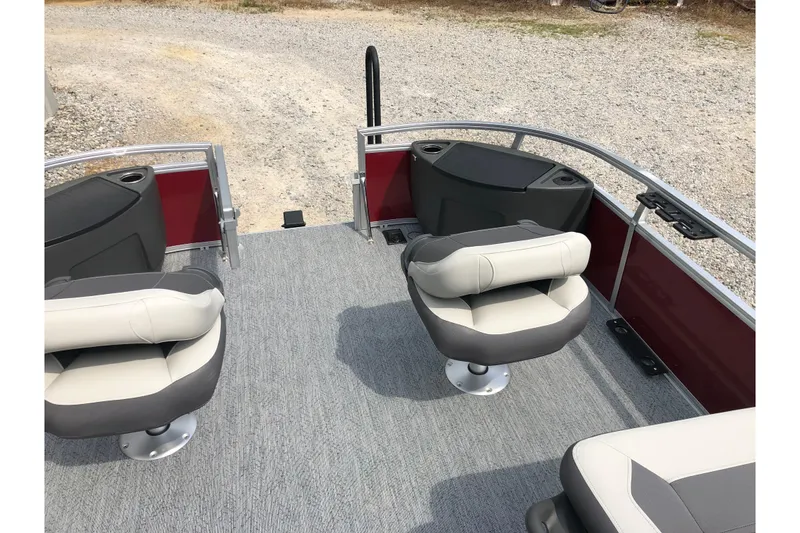 Slide: The Image of 2026 Sun Tracker Bass Buggy 18 DLX boat interior with swivel seat and storage compartment. - 15