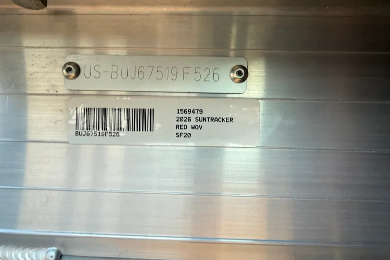 Slide: The Image of Hull identification number and label on 2026 Sun Tracker SportFish 20 DLX boat. - 13