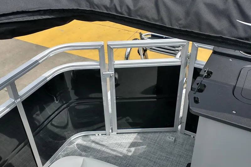 Slide: The Image of 2026 Sun Tracker SportFish 20 DLX boat seat with integrated cup holders. - 22