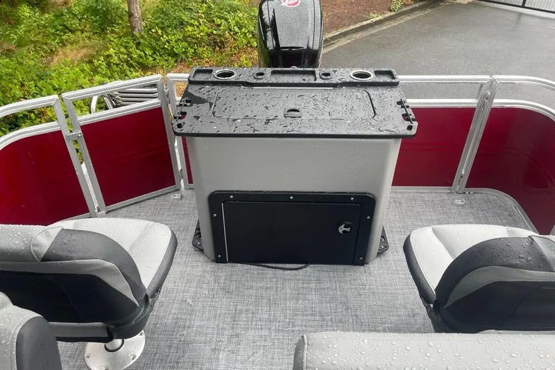 Slide: The Image of 2026 Sun Tracker SportFish 20 DLX boat interior with wet seats and console. - 71