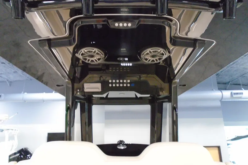 Slide: The Image of 2026 Scout 288 LXF boat interior with speakers and control panel. - 14